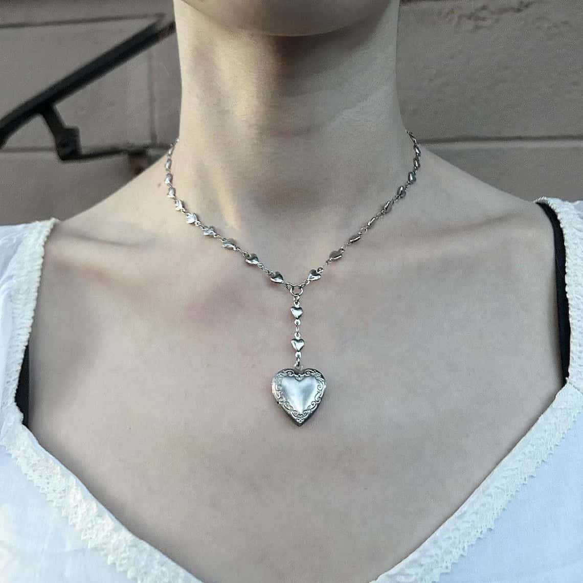 قلادة سلسلة الوهق المسبحة مع ق - مراجعة Heart Locket Necklace Photo وسعره